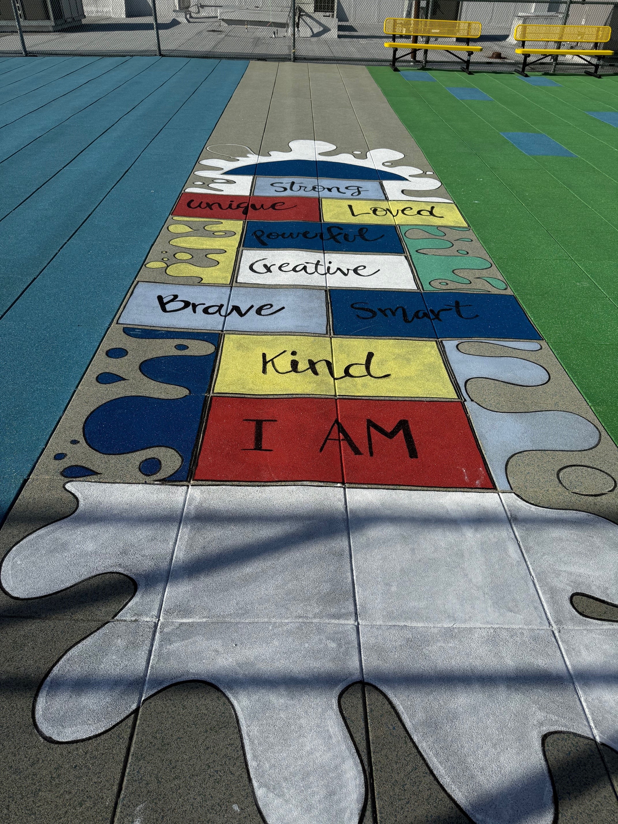 UNITY Surfacing - Painting of our tiles for addition play component